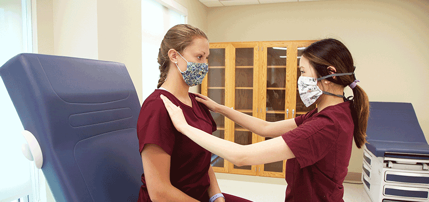 Image of Physician Assistant Studies student in lab.