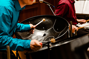 Student playng a percussion instrument.