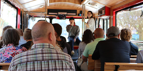 Group in the Suth trolley taking a tour of campus.