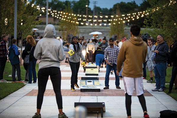 Wichita residents enjoy their evening at Social Tap, the centerpiece of Braeburn Square at the Wichita State University campus.