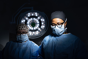 D. Baka in the surgery room in surgical mask.