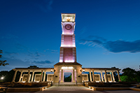 media relations photography - view at night of Moulton Tower and Alumni Plaza