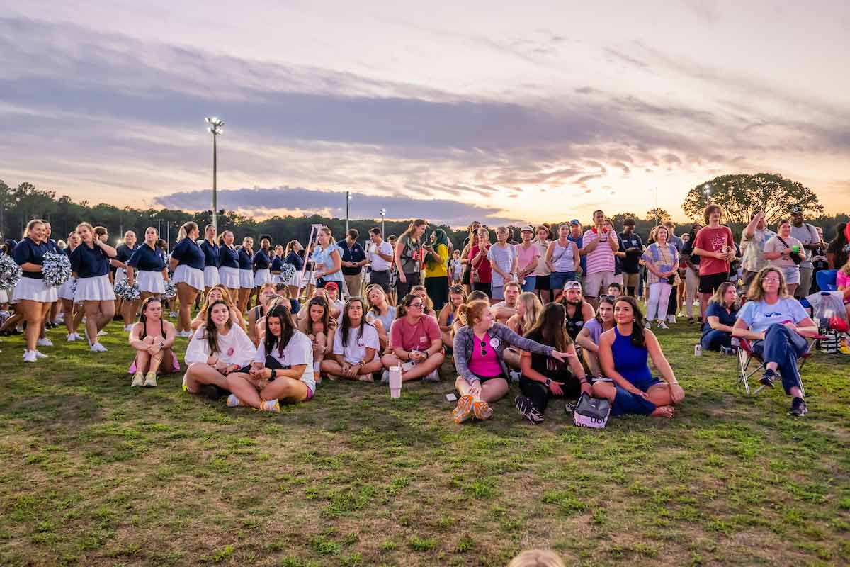 Students gathered to watch sunset on campus Students gathered to watch sunset on campus