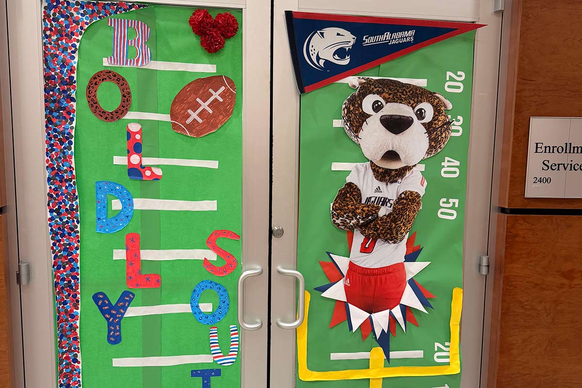 Door decorated with Southpaw and Boldly South.
